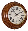 Waterbury Clock Co. 30 day oak step back case gallery clock with label and excellent rubbed out finish that looks original.