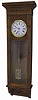 Waterbury Clock Co. "Regulator No. 7" wall clock with a great two jar mercury pendulum.