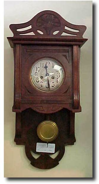 German "free swinger" wall clock, circa 1890 — Antique Clocks Price Guide