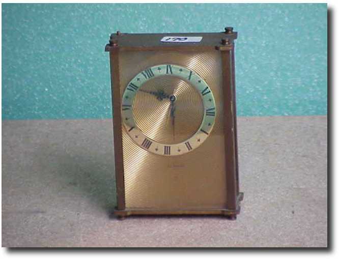 LeCoultre table clock, brass case — Antique Clocks Price Guide