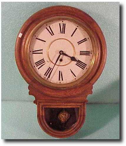 Waterbury drop dial wall clock, "Andes" case — Antique Clocks Price Guide