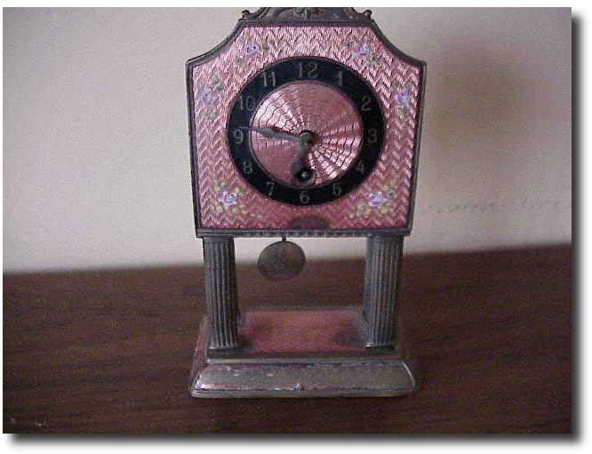 Table clock with enamel dial, 4" — Antique Clocks Price Guide