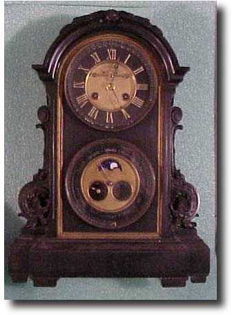 French marble case calendar mantle clock — Antique Clocks Price Guide