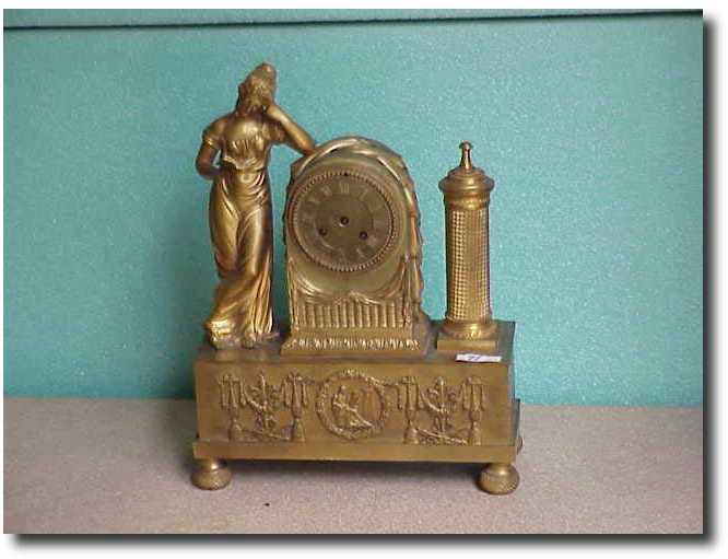 French brass figural clock — Antique Clocks Price Guide