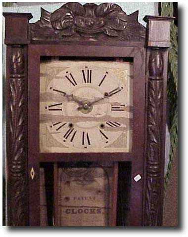 Split column mantel clock by Rodney Brace — Antique Clocks Price Guide