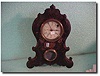 Waterbury iron front shelf clock