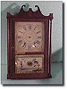 Pillar and scroll clock by Chauncey Ives