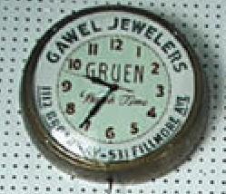 Electric advertising clock sign for "Gawel Jewelers 1112 Broadway-531 Fillmore Ave, Greun Watch Time". — Antique Clocks Price Guide