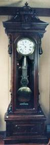 Gilbert jeweler s walnut regulator No. 8 — Antique Clocks Price Guide