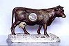 Cow figural advertising clock