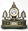 FANCY FRENCH ORMOLU AND GREEN TORTOISE SHELL MANTEL CLOCK.