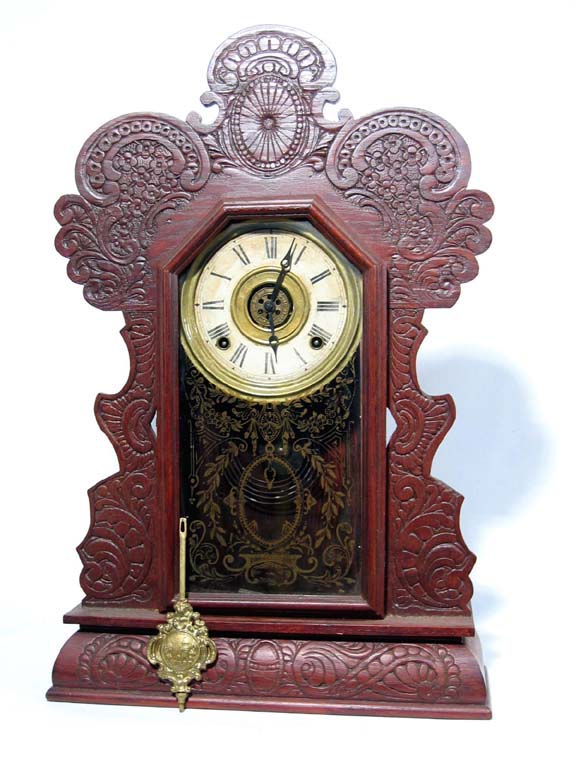Ingraham "Gila" pressed oak kitchen clock. — Antique Clocks Price Guide