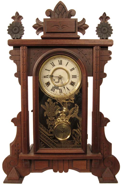 Walnut parlor clock, probably by New Haven. — Antique Clocks Price Guide