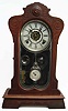 Waterbury "Clifton" walnut parlor clock.