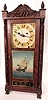 Rare Silas Hoadley carved column clock with upside down movement and alarm.