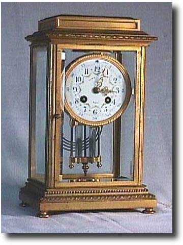 Four Glass Crystal Regulator Clock — Antique Clocks Price Guide