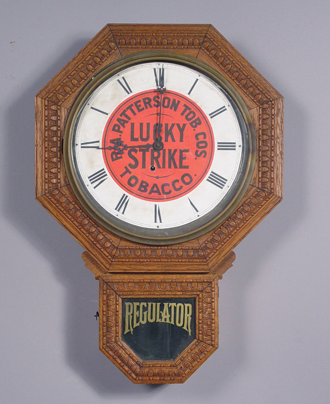 American Ingraham Clock Co. "Drop Octagon, 12 inch" Pressed Oak Advertising Wall Timepiece, — Antique Clocks Price Guide