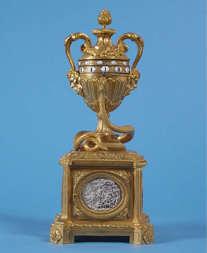 French Mystery Annular Dial Dore' Bronze and Silver Urn Clock, — Antique Clocks Price Guide