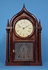 American Brewster and Ingrahams Walnut "Onion Top Candlestick" Shelf Clock,