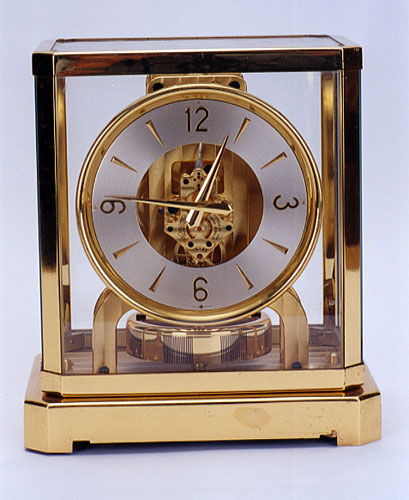 LE COULTRE "ATMOS" CLOCK, brass cased with glass top, — Antique Clocks Price Guide