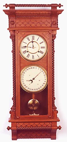VICTORIAN DOUBLE-DIAL CALENDAR WALL CLOCK, Waterbury Clock Co., Waterbury, Connecticut, late 19th century; — Antique Clocks Price Guide