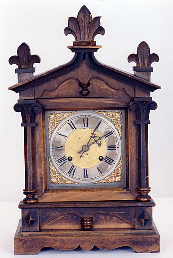 A GERMAN MANTEL CLOCK. — Antique Clocks Price Guide