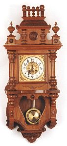 WALNUT CASED BALCONY CLOCK, German, 19th century, — Antique Clocks Price Guide