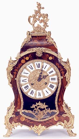 AN ITALIAN MANTEL CLOCK, — Antique Clocks Price Guide