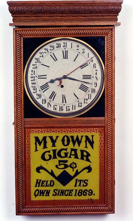 AN INGRAHAM ADVERTISING CALENDAR CLOCK, the "Northwestern", — Antique Clocks Price Guide