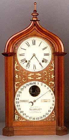 ITHACA CALENDAR SHELF CLOCK, "Steeple", 8 day time, strike and alarm — Antique Clocks Price Guide