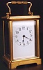 A FRENCH BRASS CASED CARRIAGE CLOCK,