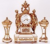 A FRENCH DIRECTOIRE THREE PIECE FIGURAL CLOCK SET: