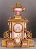 GILT BRONZE AND PORCELAIN MANTLE CLOCK,