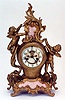 AN AMERICAN MANTLE CLOCK by Waterbury in the French taste.