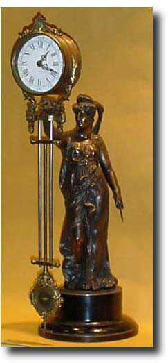 French Figural swinging arm Mystery clock c1880 — Antique Clocks Price Guide