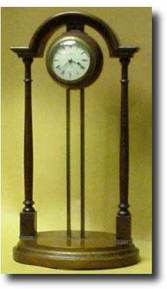 English Gravity clock by Ellienson c. 1908 — Antique Clocks Price Guide