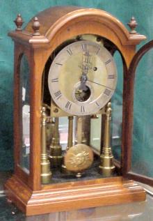 Bracket clock in oak with 3 glass mirror backed case. — Antique Clocks Price Guide