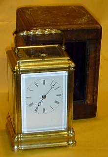 Grande Sonnerie quarter striking carriage clock in gorge case with leather carrying box. — Antique Clocks Price Guide