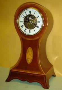 Eureka in balloon case. — Antique Clocks Price Guide