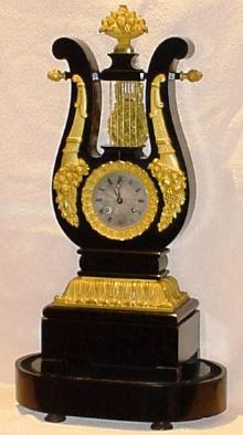 French lyre shaped mantel clock with top pendulum. circa 1860 — Antique Clocks Price Guide