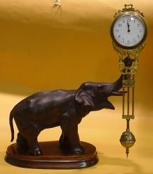 Mystery clock in "Elephant" pattern — Antique Clocks Price Guide
