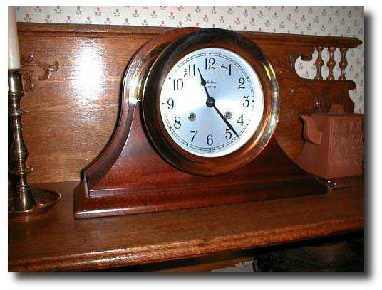 Chelsea Ships Clock, circa1970-85, on walnut stand — Antique Clocks Price Guide