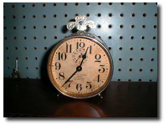 Waterbury "tin can" alarm clock c. 1907 — Antique Clocks Price Guide