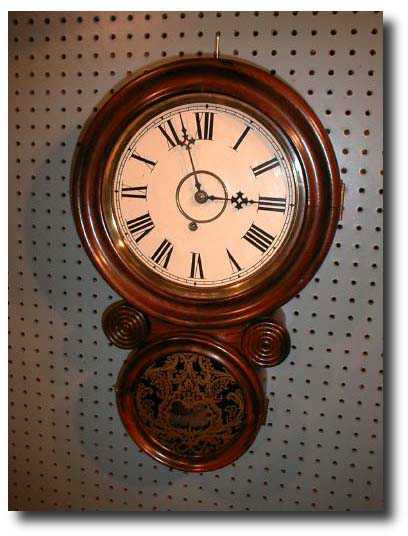 Ionic Wall Clock c. 1911 — Antique Clocks Price Guide