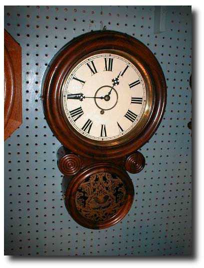 Figure Eight wall clock c. 1885 — Antique Clocks Price Guide