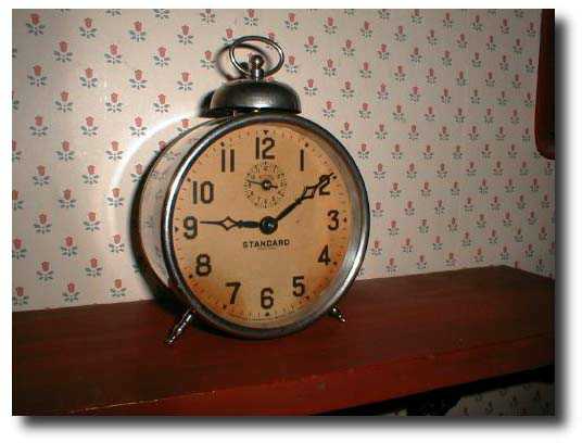 Tin alarm clock circa 1857-80 — Antique Clocks Price Guide