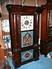 Eight day mantle clock with rare Atkins brass weight-driven