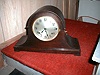 Quarter-chiming mantel clock with Westminster melody.