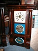 Cornice and column mantle clock with eight-day weight-driven brass