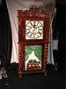 Eight-day shelf clock with strike on the hours.